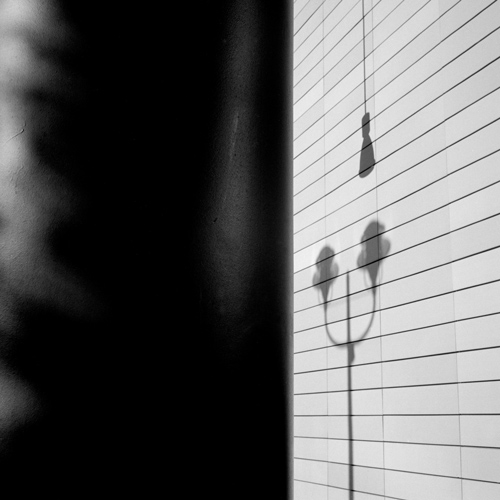 Shadow of lampposts, Berlin